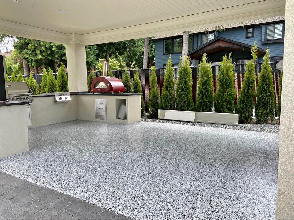 Finished flake flooring on a covered outdoor patio in the Comox Valley